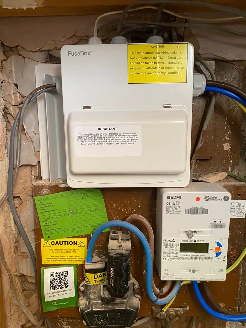 A modern consumer unit fitted above the meter